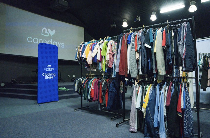 The Care Days clothing store set up in a hall