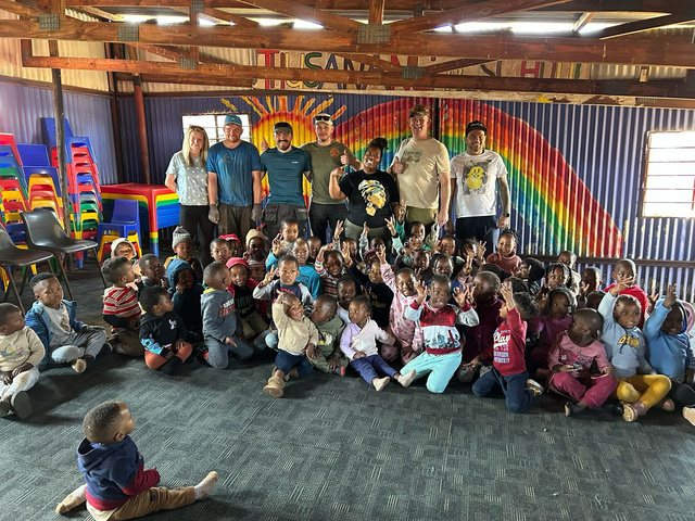 The Valley Church mission team with children at Thusanang Pre School