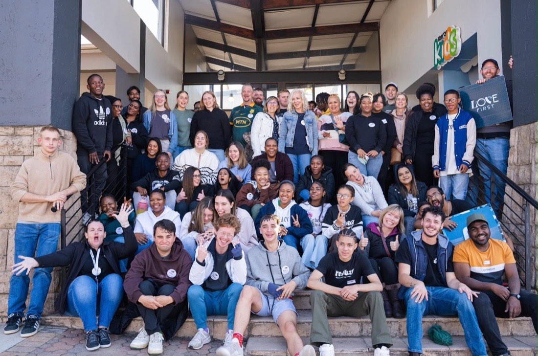 Liberty Compassion volunteers gathered on the steps at Liberty Church